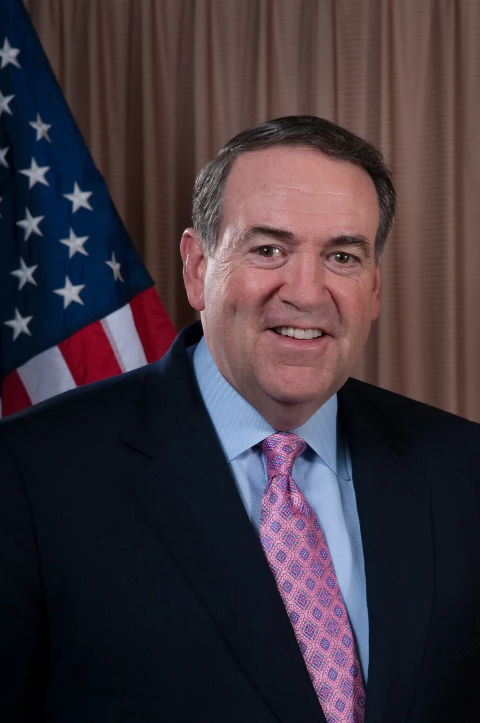 Portrait of Governor Mike Huckabee, keynote speaker at the 50th Annual Louisiana Governor's Prayer Breakfast in 2014